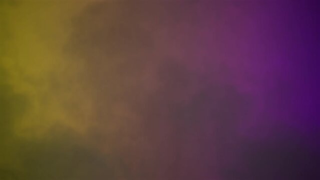 Purple and yellow hazy smoke motion background or effect overlay video using blending modes