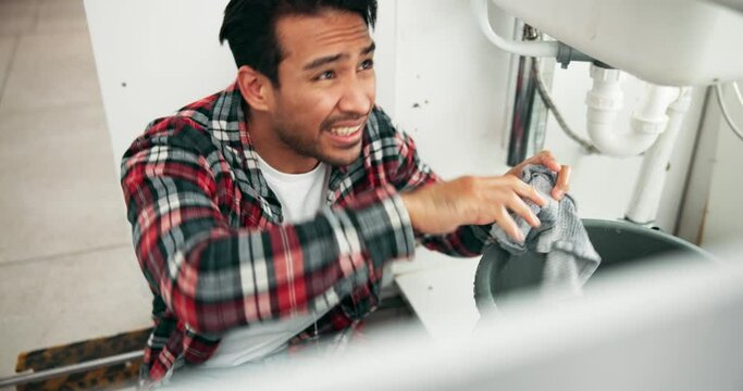 Frustrated man, plumbing and water leak with problem, flood or mistake on maintenance, repair or pipe burst by sink. Male person, plumber or handyman with faucet issue or dripping leakage by home