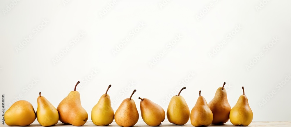 Aufkleber A scene showing ripe pears arranged neatly on a clean white surface with empty space for text or other elements in the image. with copy space image. Place for adding text or design