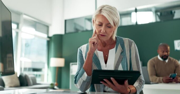 Thinking, problem solving or mature businesswoman on tablet reading news for project task or solution. Financial research, doubt or confused account manager checking investment for question in office