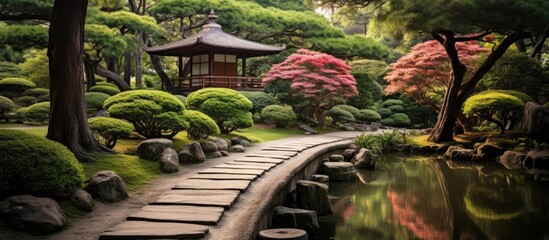 A beautiful pathway in a serene Japanese garden with oriental features, surrounded by lush greenery and peaceful ambiance, ideal for a copy space image.
