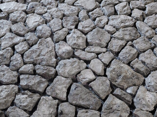 Stone wall background, old road, old stone walkway