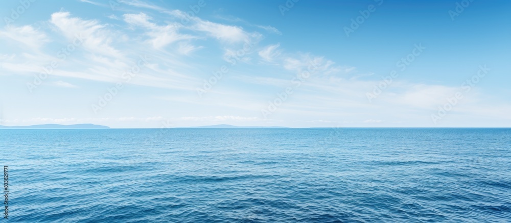 Poster Scenic view of the horizon over the sea with a vast expanse of ocean and sky, providing a tranquil setting for a copy space image.