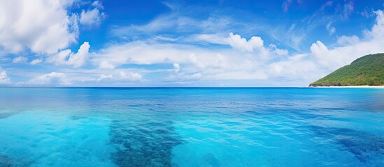 Fototapeta premium Saipan features deep blue waters, creating a scenic backdrop with a copy space image.