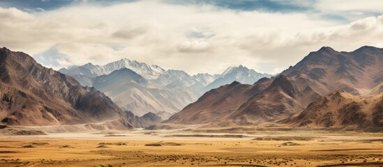 The scenic route leading to Leh showcases breathtaking mountain landscapes and serene surroundings, perfect for capturing a picturesque copy space image.