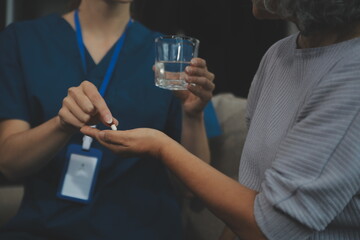 Doctors are giving advice on medication to patients in hospital examination rooms, treating diseases from specialists and providing targeted treatment. Concepts of medical treatment and specialists.