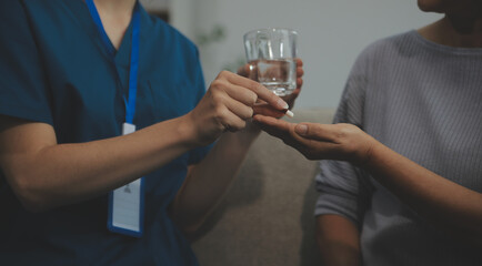 Doctors are giving advice on medication to patients in hospital examination rooms, treating diseases from specialists and providing targeted treatment. Concepts of medical treatment and specialists.