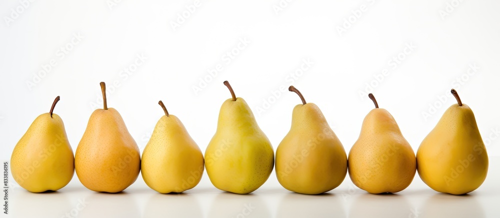 Poster A scene showing ripe pears arranged neatly on a clean white surface with empty space for text or other elements in the image. with copy space image. Place for adding text or design