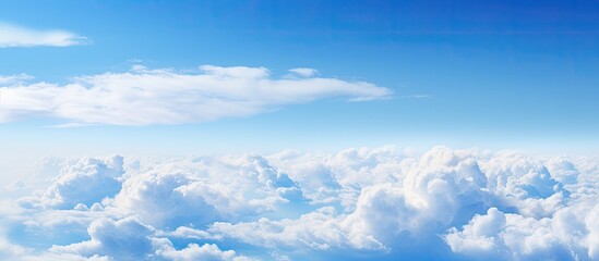 Clouds drifting against a scenic blue sky, perfect for copy space image.