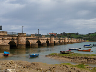 Boats stranded in the sand at low tide (San Vicente de la Barquera)