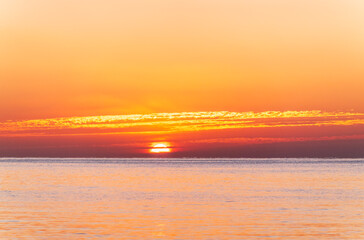 Beautiful red and orange sunrise over the sea.