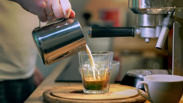 preparing vegan cereal coffee with oat milk