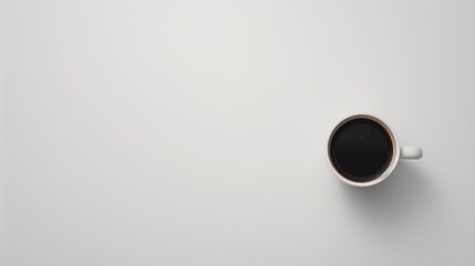 Minimalist Flat Lay of a White Coffee Cup Filled with Black Coffee