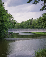 Scenic view of a river against cloudy sky
