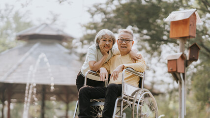 Elderly couple. Asian elderly couple giving love to each other smiling happily. Love and care for...