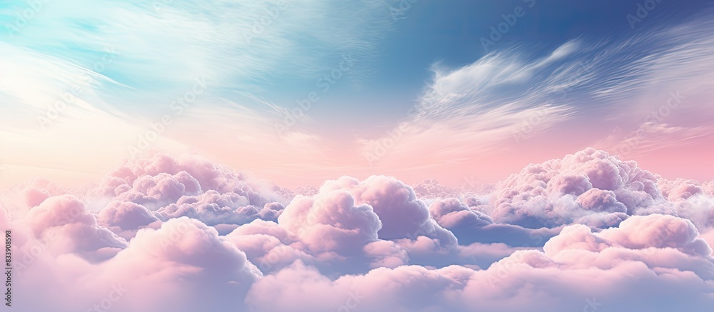 Poster Soft focus pastel-colored clouds create a dreamy backdrop with ample copy space image.
