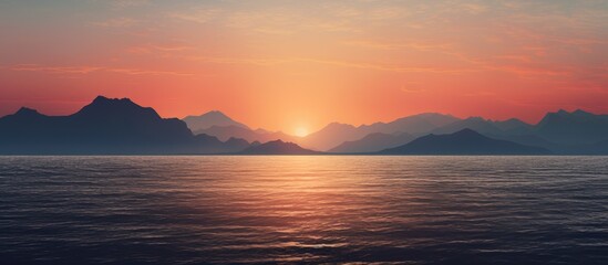 Naklejka premium A scenic seascape at sunset with mountains in the backdrop, ideal for a copy space image.