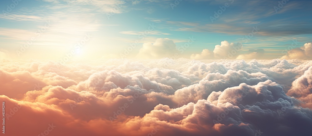 Poster morning sunlight illuminates a sky with a hint of clouds, providing a serene copy space image.