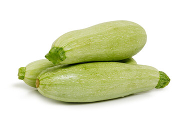 three fresh zucchinis isolated