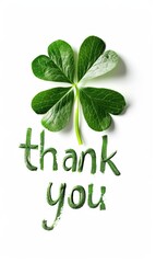 A four-leaf clover above the phrase "thank you" written in green