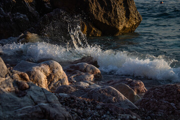 Naklejka premium salty waves crashing onto the rock , Montenegro