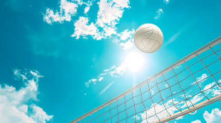 Beach volleyball ball and net under the blue sky, summer seascape background perfect for travel blogs, sports event promotions, and vacation advertisements, includes ample copy space for text
