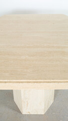 Vintage hexagonal stone dining table. Interior product photograph.