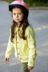 Little girl on roller skates at park