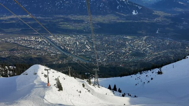 View over the Innsbruck valley from the snow-covered Nordkette, Tyrol, Austria