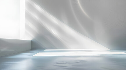 Minimal abstract light blue background for product presentation. Shadow and light from windows on plaster wall.
