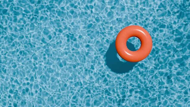 Swimming pool top view. Red swimming ring in the empty clear pool.