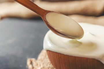 Homemade yogurt or sour cream in a wooden bowl, Health food from yogurt concept