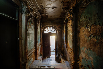 Entrance hall in old ruined abandoned mansion