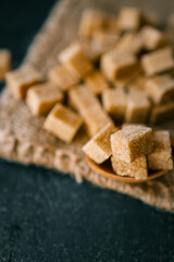 brown sugar heap and wooden spoon