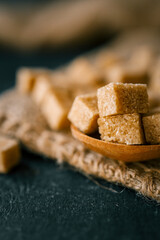 brown sugar heap and wooden spoon