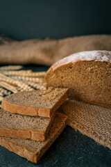 Freshly baked homemade bread and ears of wheat