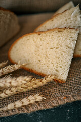 Freshly baked homemade bread and ears of wheat