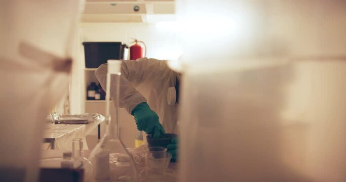 Experiment, scientist and mix pills in lab, procedure and dangerous drugs or powder for chemistry. Person, hazardous and ketamine for cdc, protective gear and mortar or pestle for grinding tablet
