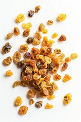 Obraz premium A close-up shot of a pile of brown raisins on a white surface