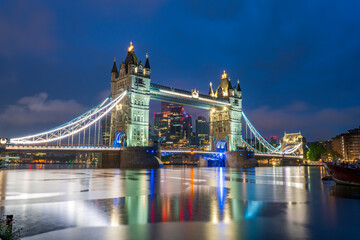 Tower Bridge illuminated at night in London. England	