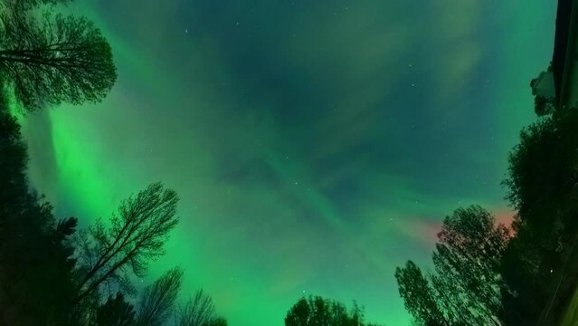 Amazing night time lapse, starlapes, featuring moving stars, clouds, Northern Lights, and ever-changing, moving perspective. This is an entirely real time lapse shot with a 360 degree camera.
