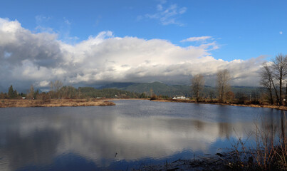 Clouds above the mountains in an autumn day