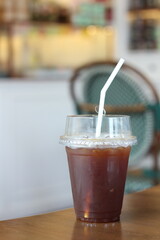 Cold Americano on a coffee shop table
