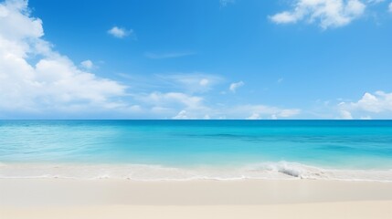 Scenic View of a Serene Beach with Clear Blue Water and a Sunny Sky