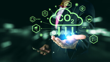 Businessman hand holding earth and icon, save planet, earth day, sustainable living, ecology environment, climate emergency action, world environment day concept, global warming content.