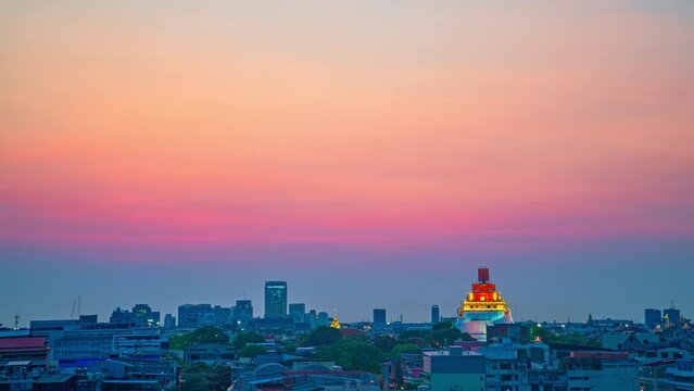 time lapse Beautiful picture as the sun sets behind the buildings in Bangkok.
Phukhao Thong in Bangkok during repair. Golden Mountain Pagoda, Wat Saket the famous golden pagoda in Bangkok Thailand.