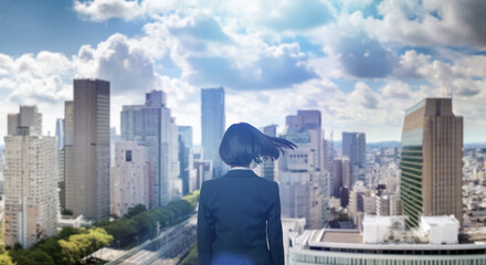 日本の街・都市・朝日を受けたオフィスビル群を前に佇み風を受けて髪をなびかせる会社員の女性の出勤　就職・ビジネス・はじまり・決意・目標・挑戦のイメージ