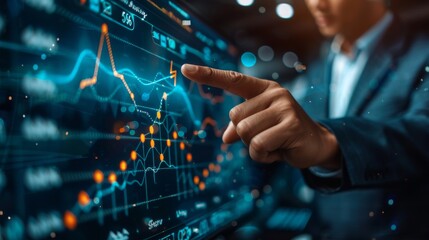 Business man pointing upward growth graphic line with arrow, showing business growth and success concept on virtual screen background.