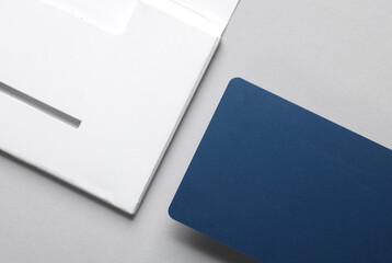 New credit card mockups with white cardboard box on gray background