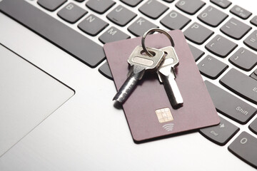 Credit card with keys on laptop keyboard